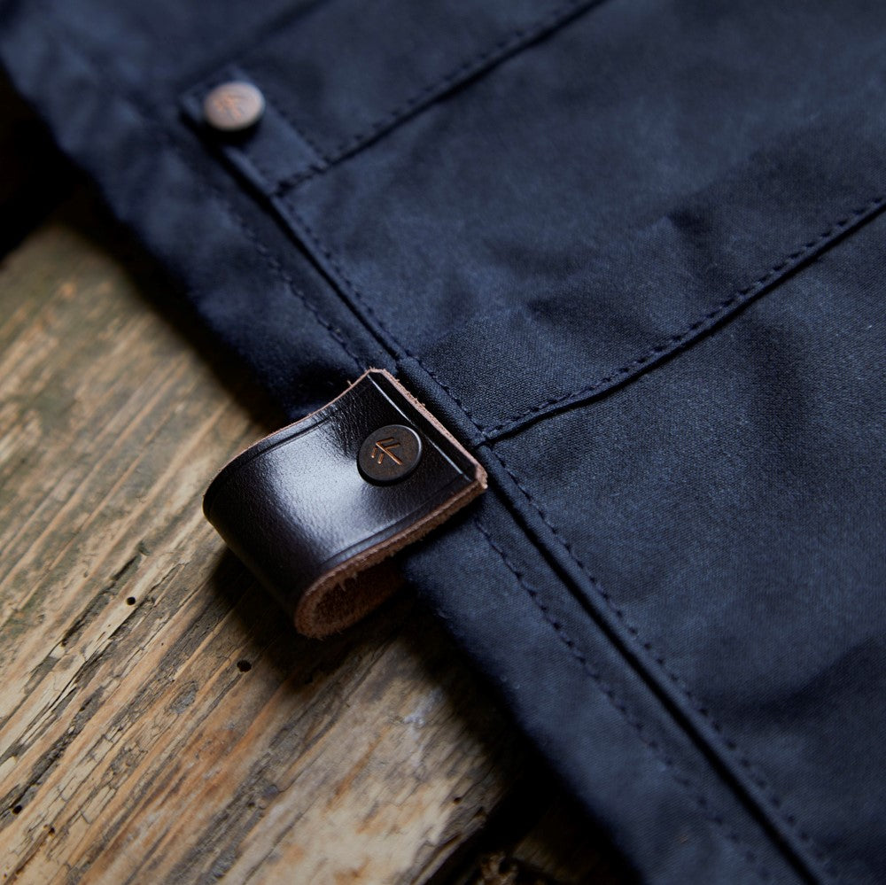 leather loop for tools on apron, apron made for barbecue, apron for BBQ, aprons specifically designed for outdoor cooking, tool hook on apron, wax cotton apron made in the UK,  eco outdoor apron, sustainable outdoor apron